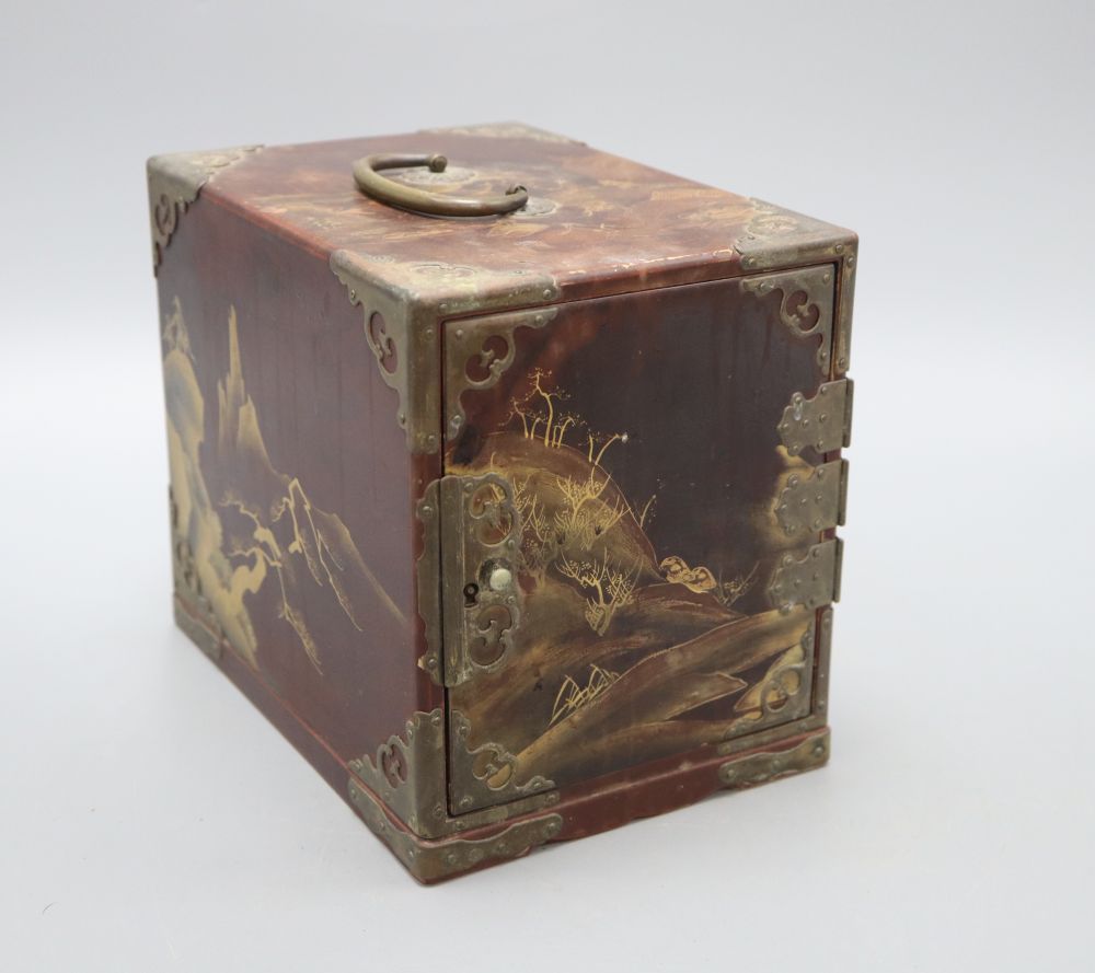 A Japanese lacquer table cabinet, height 18cm (locked)
